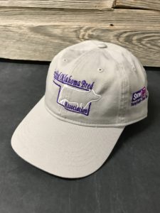 Khaki baseball cap with purple Oklahoma embroidery
